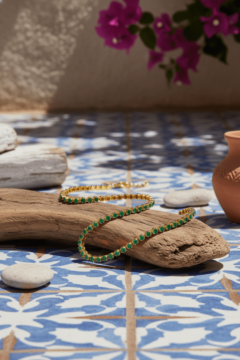 Green bracelet on a rock with a floral background